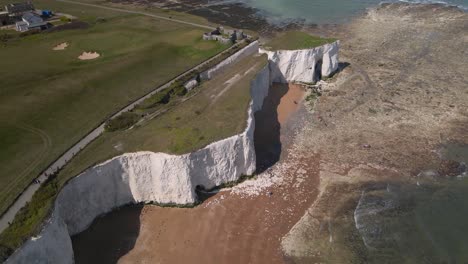 kingsgate bay chalk cliff coastal formation english kent seaside aerial birdseye view drone flying over