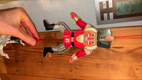 nutcracker toy with cord to move