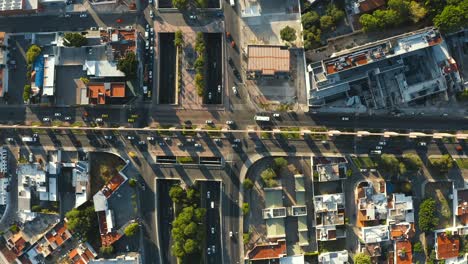 Vertical-aerial-view-of-the-aqueduct-of-the-city-of-Queretaro-Mexico,-4K