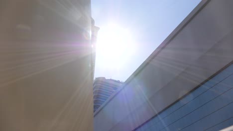 driving out of a tunnel to see big skyscrapers in dubai