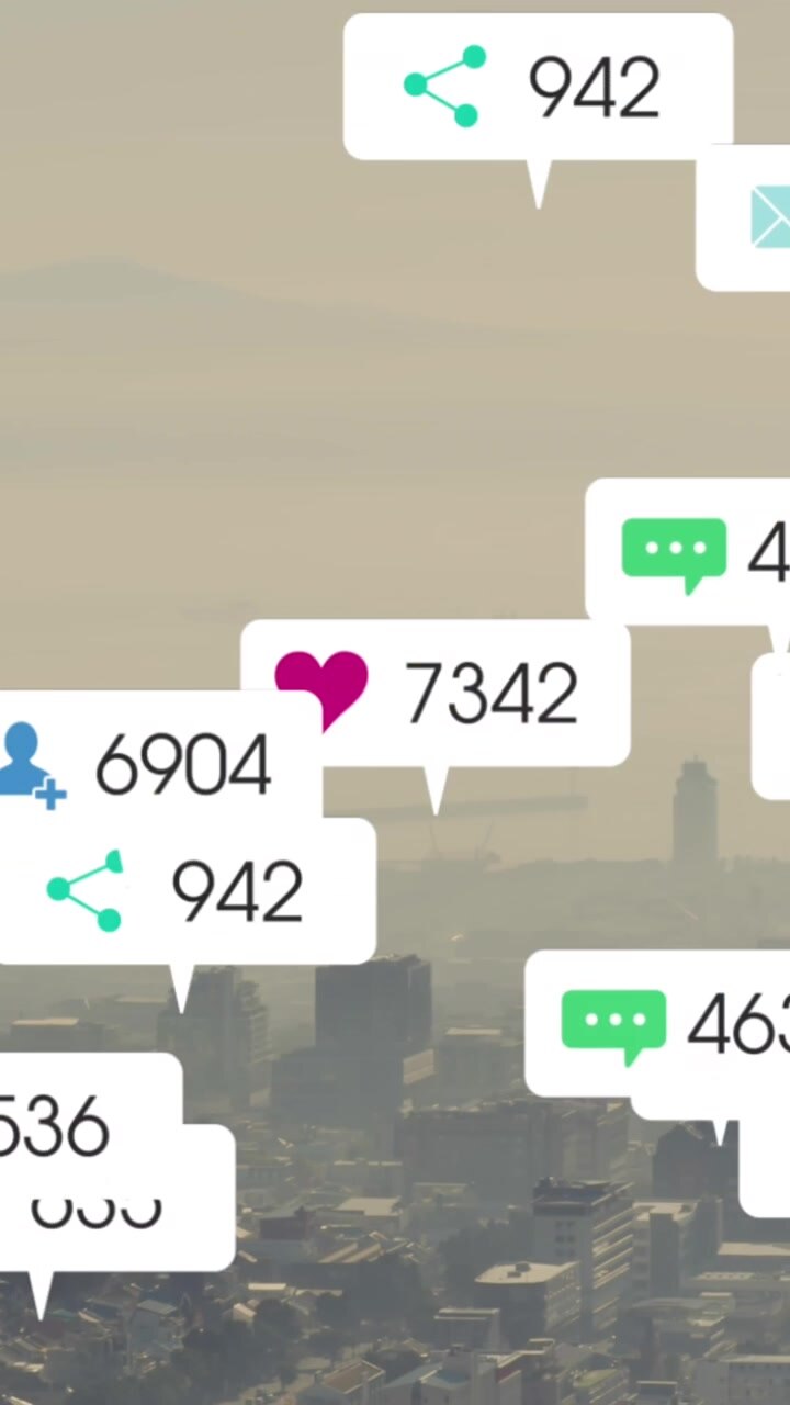 Animation of message icons with changing numbers over fog covered modern city