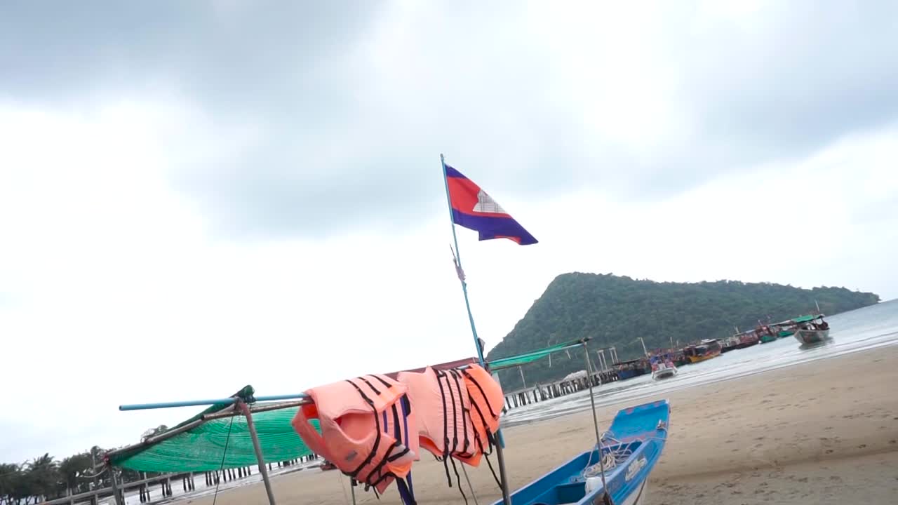 Cambodian flag shown in iconic Cambodian environment