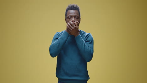 man demonstrates see no evil, hear no evil, speak no evil concepts