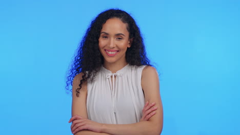 Woman,-portrait-or-arms-crossed-on-isolated-blue