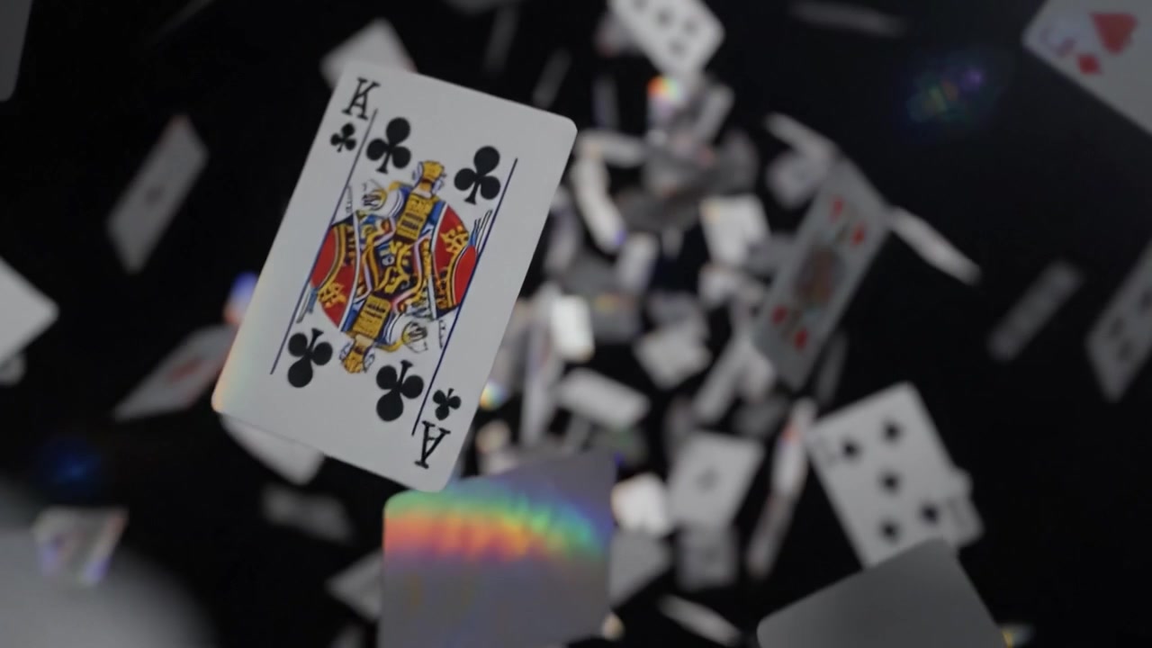 A Captivating Display of Playing Cards Cascading Through the Air, Creating a Mesmerizing Visual Feast with a Blend of Color and Movement