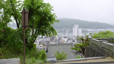slider reveal over rainy onomichi city on cloudy day