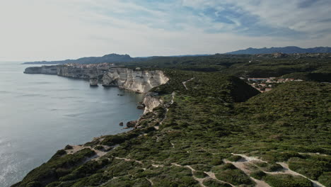 aerial view of cliff overlooking water in corsica, france