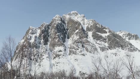 quick tilt from snowy foreground to a mighty mountain