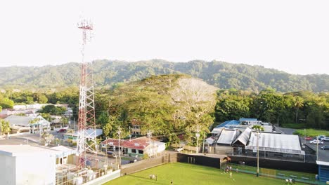 football players running training drills at a soccer stadium in jaco, costa rica