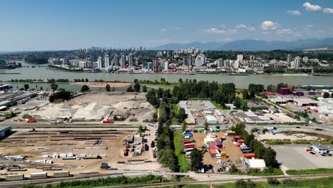 City-Skyline-Of-Vancouver-Nearby-The-Fraser-River-On-A-Daytime-In-BC,-Canada