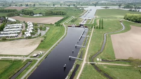 Drone-footage-of-the-suburban-near-the-big-canal-in-Holland