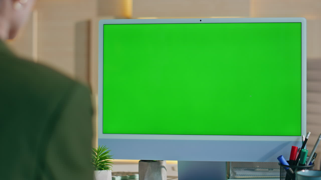 Manager working mockup computer in office closeup. Woman looking on green screen