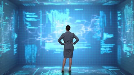 Businesswoman-coding-on-tech-interface
