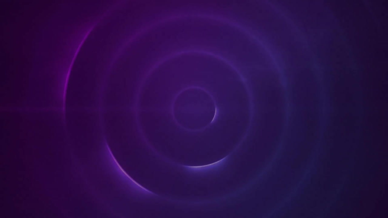 animación de puntos brillantes de luz que se mueven sobre un fondo púrpura