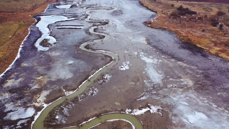 natural problems of water. dirty stream of dried lake. gloomy background of environment. global warming. aerial view.