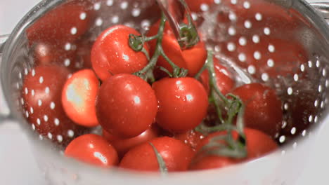 tomatoes being washed in super slow motion