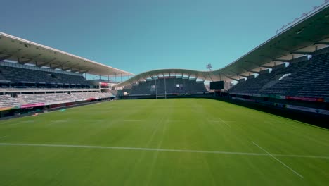 fpv drone descends at high speed into southern france rugby stadium