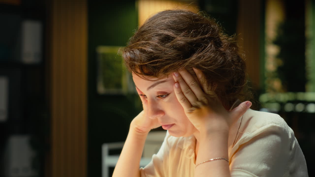 Vertical Video Drained restless woman going into mental haze with after hours tasks