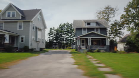 Ride-Along-Typical-American-Suburbs-View-From-The-Window-Of-The-Car---Visible-White-Wooden-Houses-An