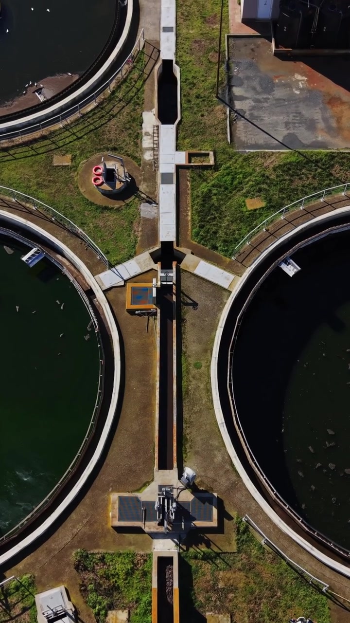 Active water treatment plant with large tanks and equipment