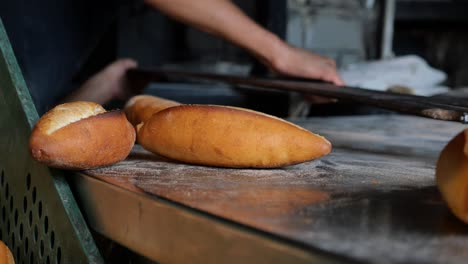 freshly baked baguettes in a bakery