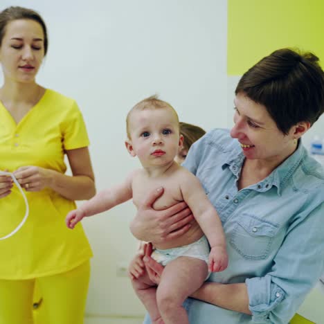 baby checked by doctor