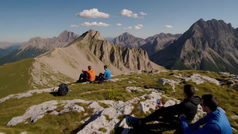 hikers enjoying the view from a mountain summit