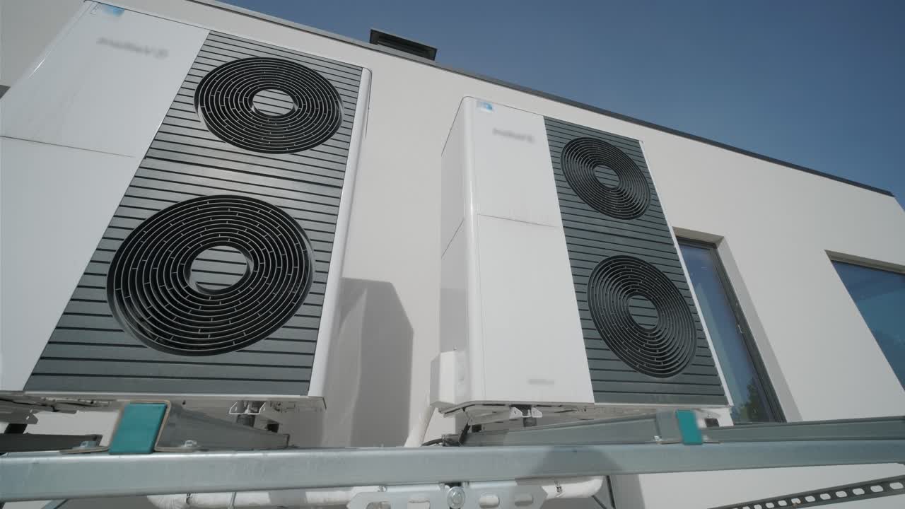 Outdoor heat pump units installed on modern building