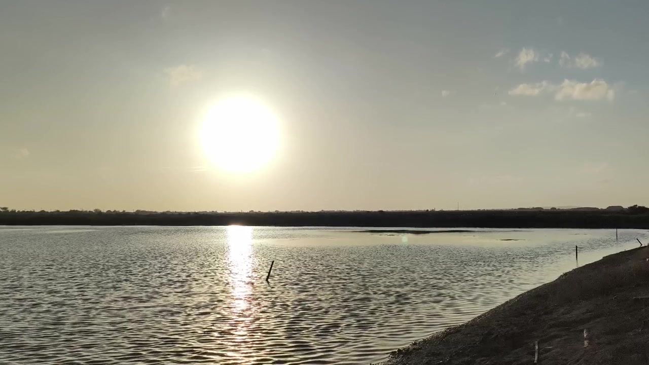 Golden Sunset Over Calm Coastal Waters