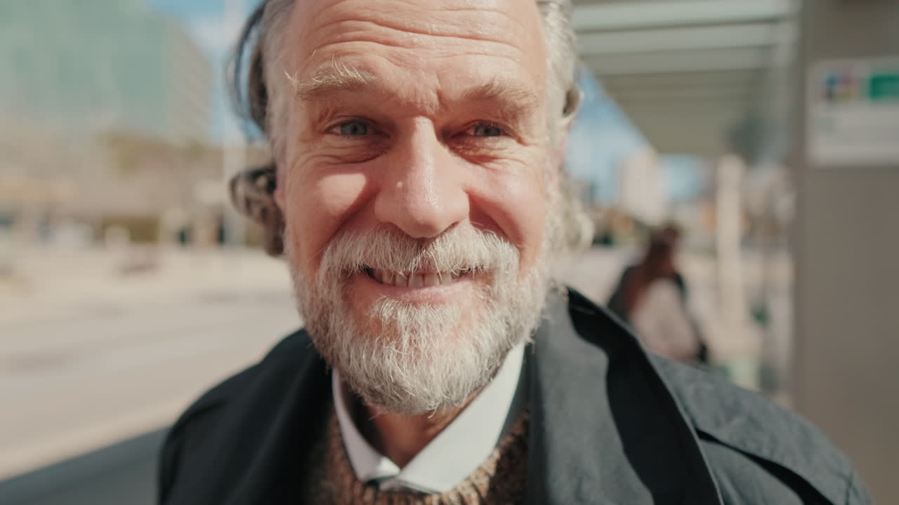 Happy Senior Man Smiling at Bus Stop
