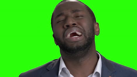close up afro-american businessman is crying.