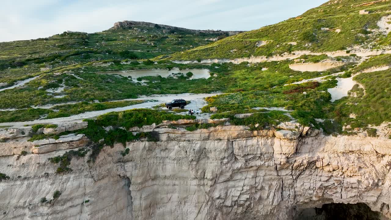 Discover the raw natural splendor of Miġra l-Ferħa, with its iconic limestone escarpments, scenic walking paths, and panoramic sea views, all captured by drone.