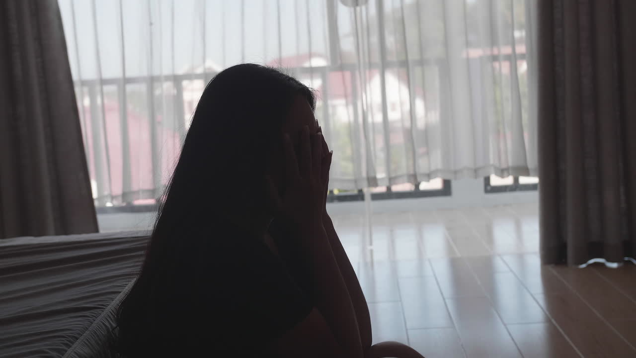 Asian Young Woman Sad And Depressed