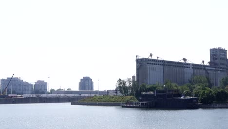 Montreal-Grain-Silos,-an-old-grain-silo-built-in-the-early-1900's-beside-the-Saint-Lawrence-River