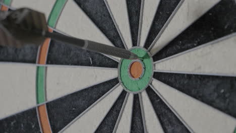 darts hitting a dart board