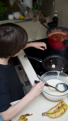 Child Cooking Pancakes