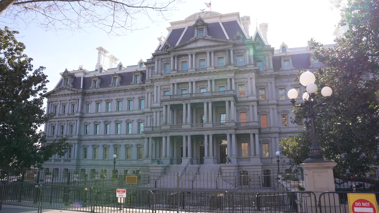 Sun beaming from behind the Dwight Eisenhower building located in Washington, DC.