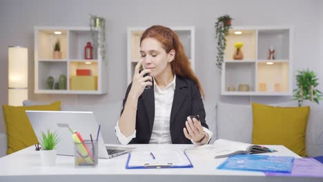 Home-office-worker-sprays-perfume-on-woman.