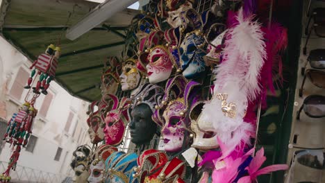 exquisite feathered venetian masks stand, venice italy