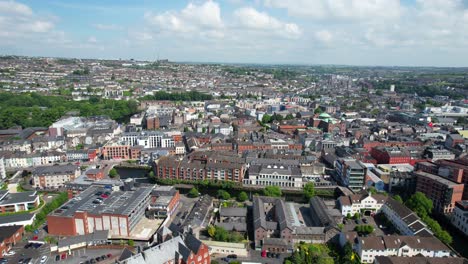 4K-Aerial-drone-static-shot-of-Cork-showing-downtown-neighborhood,-Ireland