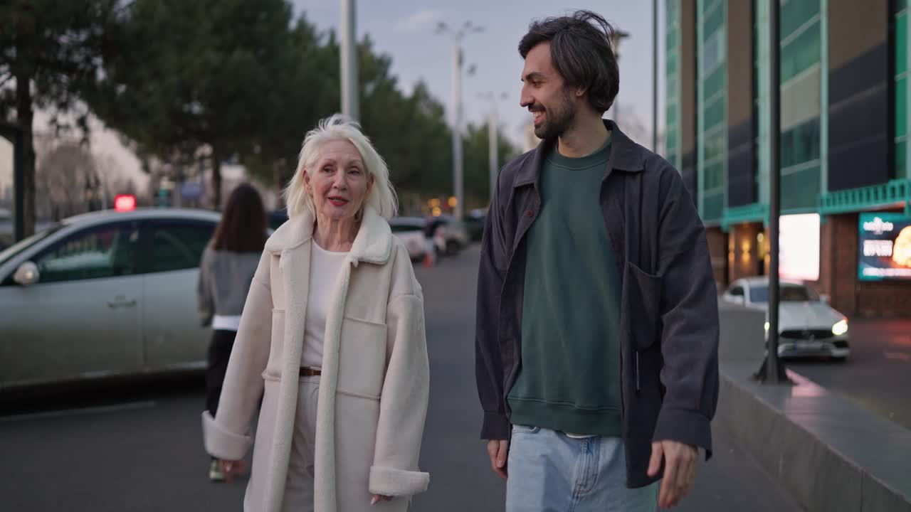 Senior Woman and Man Walking on the Street