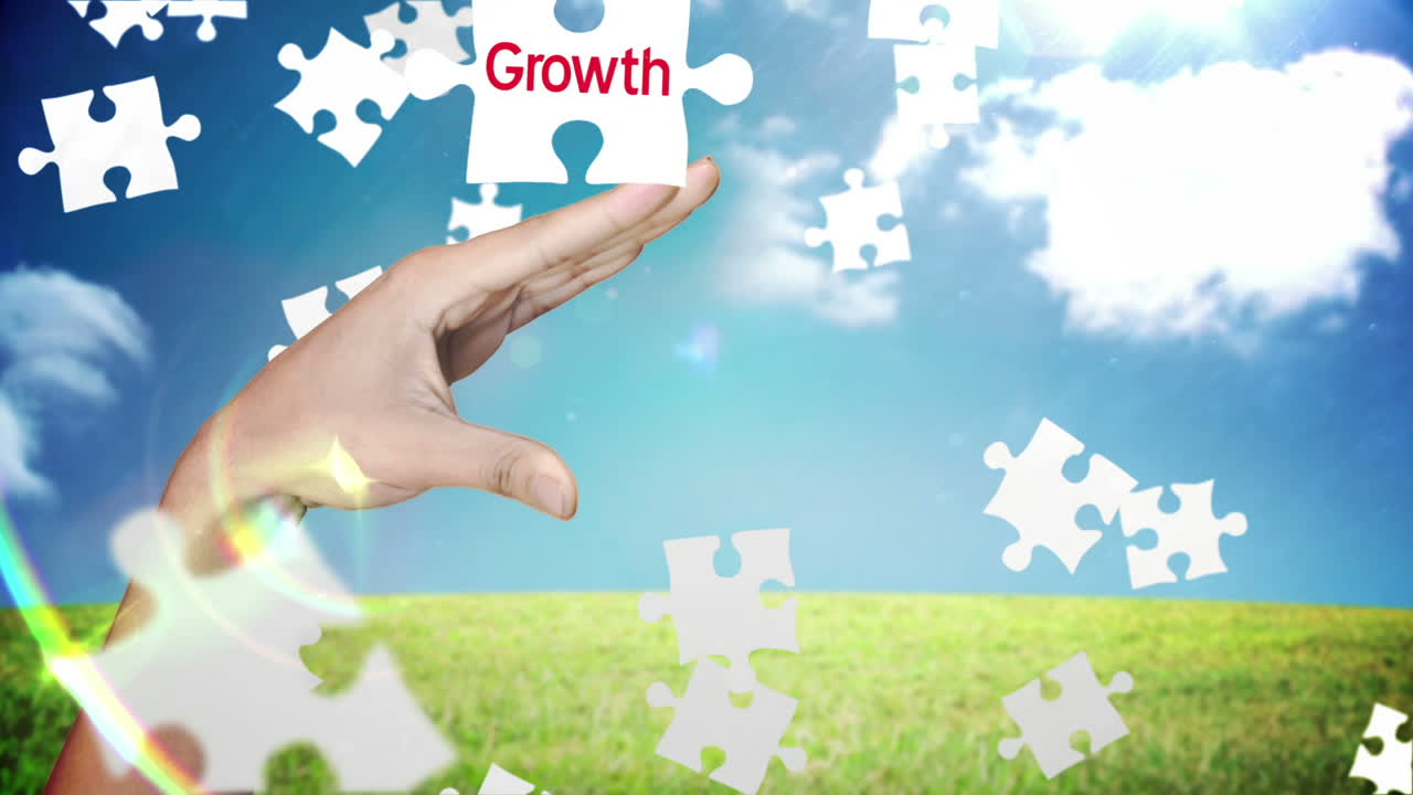 Hand of woman picking a piece of puzzle