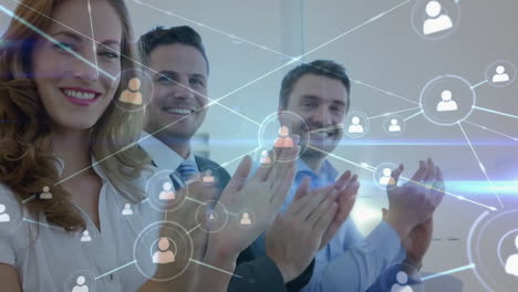 animation of network of connections over diverse colleagues clapping at meeting in office