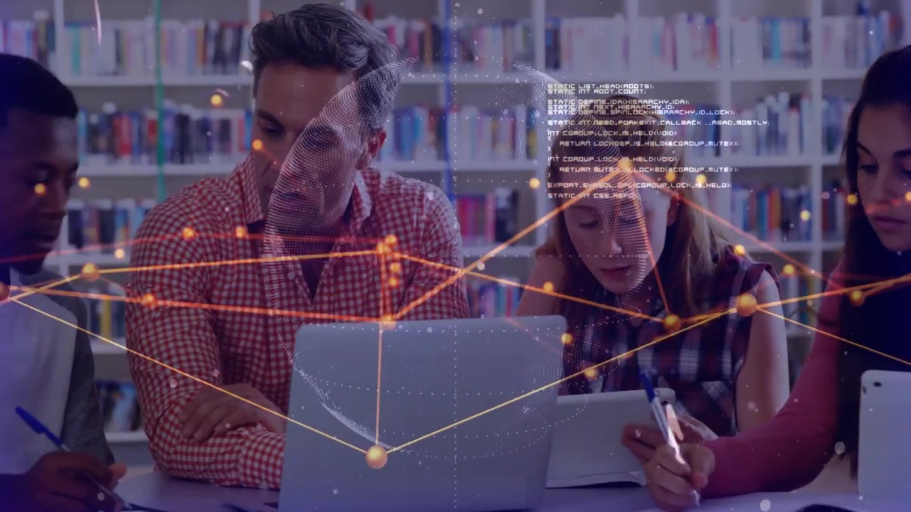 Teacher glancing at students taking notes and guiding library study through animated network data