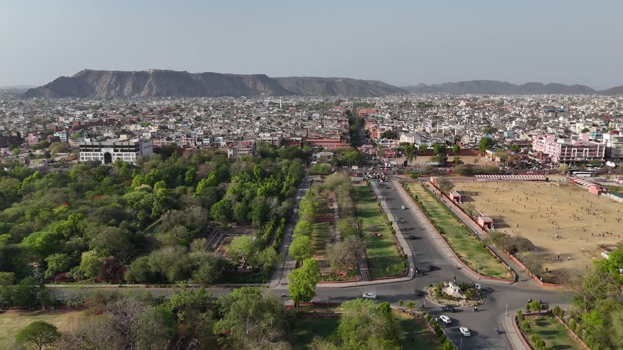 Aerial view of Jaipur Metro station surrounded by urban buildings and highways