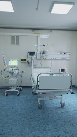 contemporary reanimation room in clinic. empty sterile hospital room with modern medical equipment for saving patients lives. vertical video