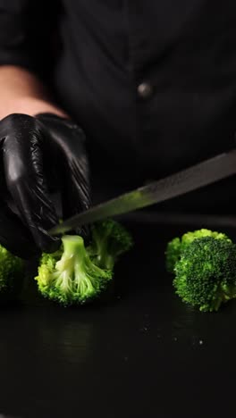 chef cutting broccoli