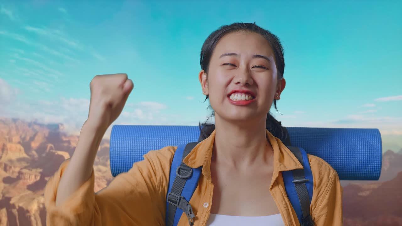 Close Up Of Asian Female Hiker With Mountaineering Backpack Screaming Goal Celebrating The Success While Traveling At The Top Of Mountain