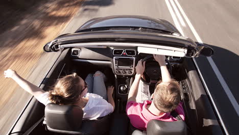 Couple-driving-convertible-car-cabriolet-cape-town-south-africa-steadicam-shot