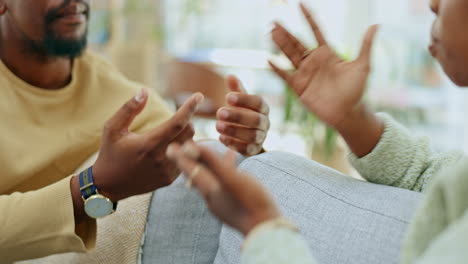 couple, hands and argument on sofa